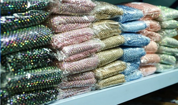Hotfix rhinestone wholesale inventory stacked on warehouse shelves
